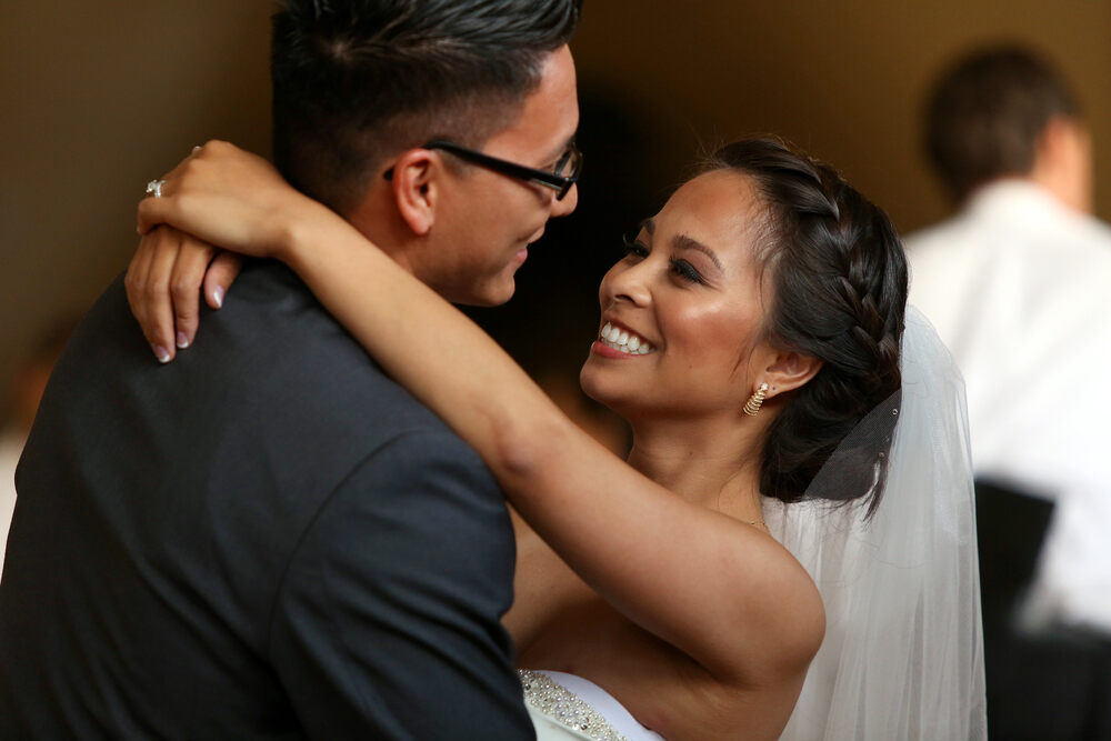 A bride and groom share an intimate moment during a first dance