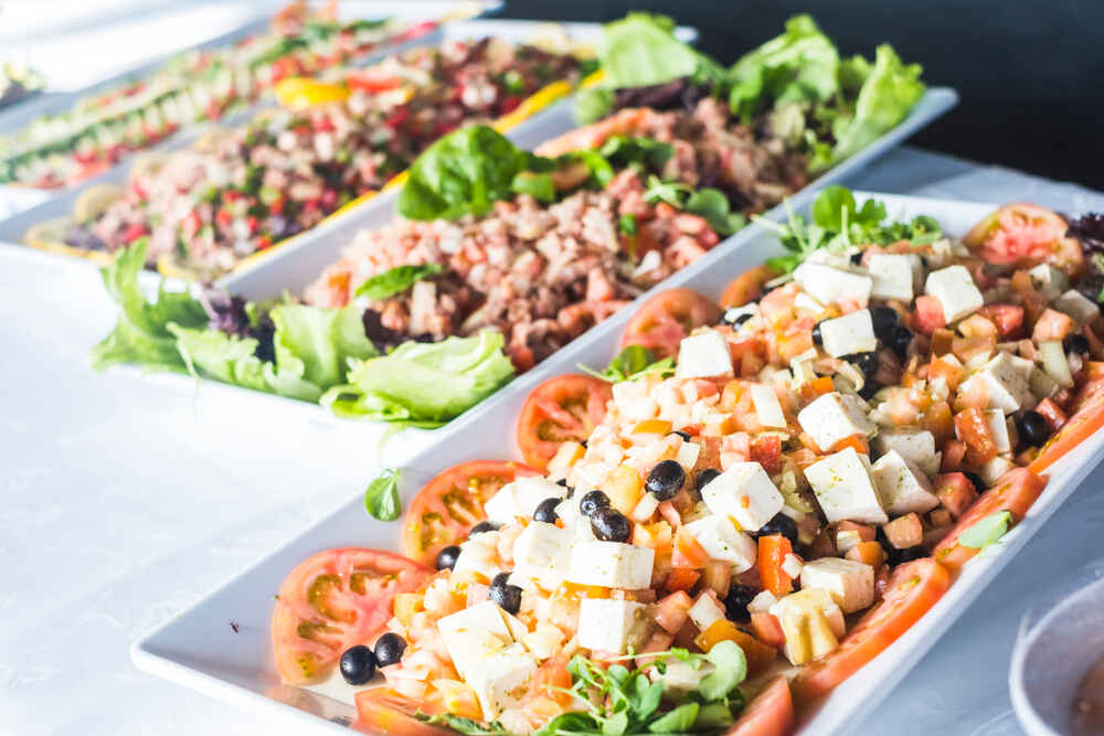 A fresh, colorful buffet spread at a catered event