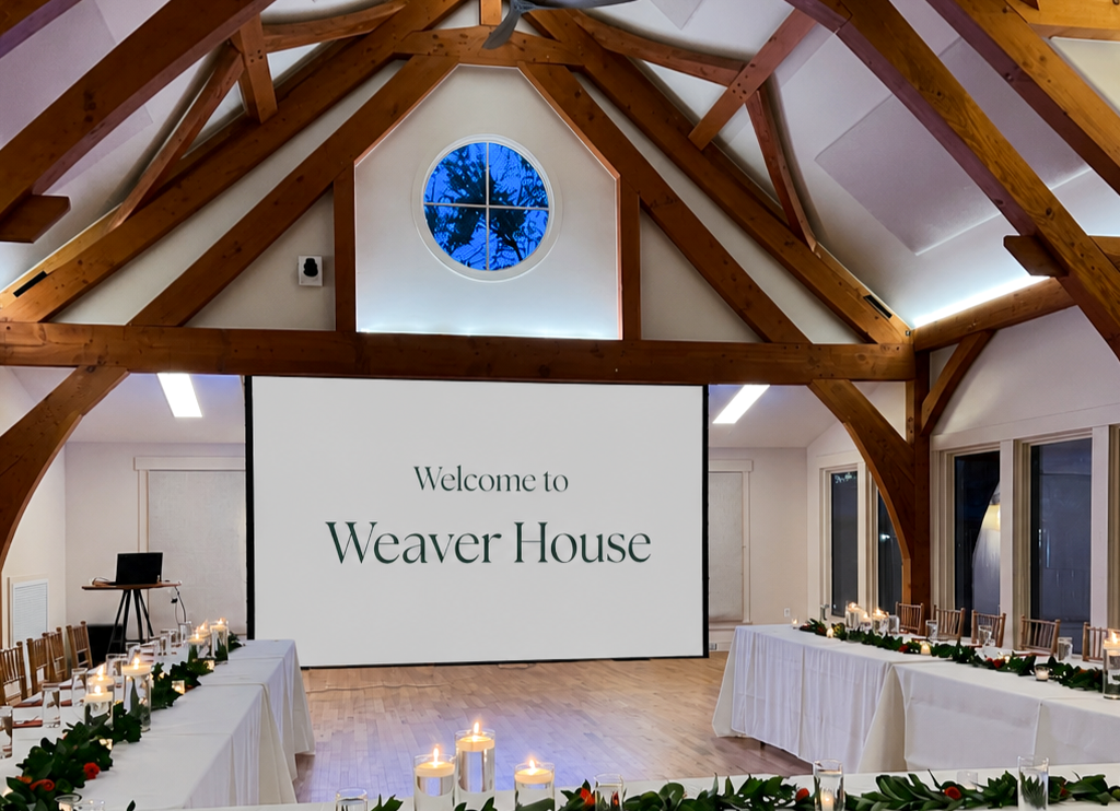 Corporate retreat presentation setup inside Weaver House event venue near Asheville NC